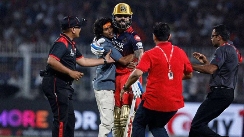 Fan Breaks Security At Eden Gardens To Touch Virat Kohli's Feet During IPL 2025 Opening Match